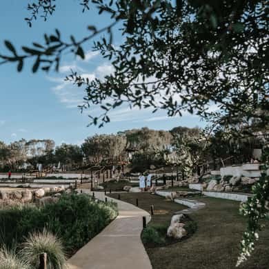 Paths and planted terraces between the pools at the hot springs