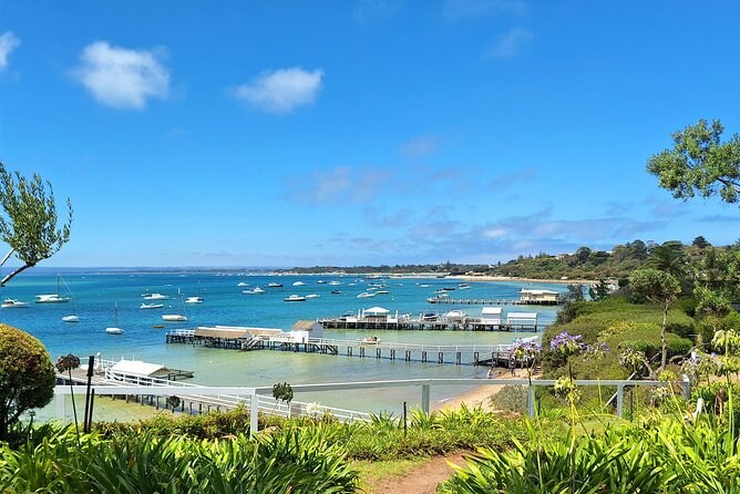 The bay at Sorrento from the cliff top, with the pier and moored boats